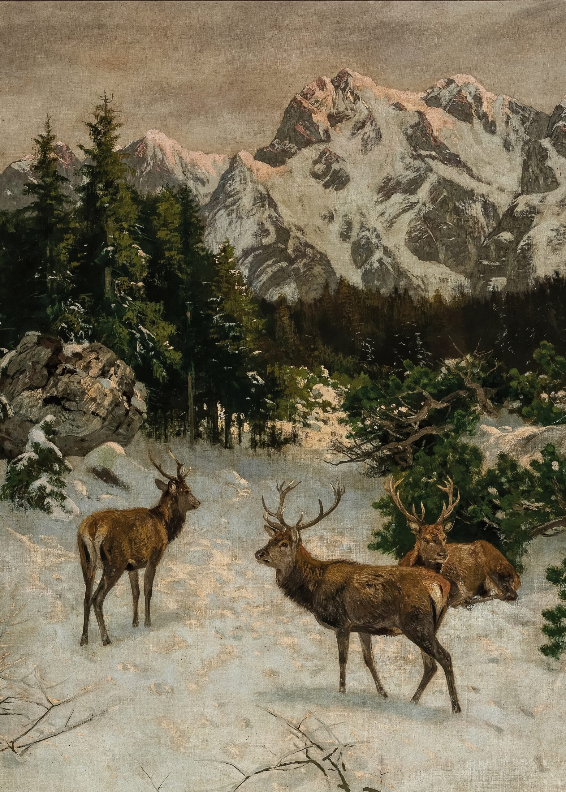 Vintage painting of three deer standing in a snowy forest clearing with tall mountains in the background.